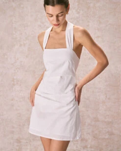 The White Halter Ruched Pleated Mini Dress 7 The White Halter Ruched Pleated Mini Dress -CINN Clothing Shop the ruched halter mini dress dresses qsxtyo