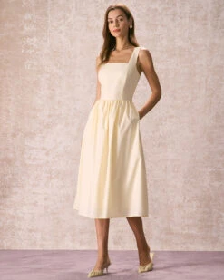 The Light Yellow Pleated Cross Back Midi Dress 8 The Light Yellow Pleated Cross Back Midi Dress -CINN Clothing Shop the square neck solid midi dress light yellow dresses rh2ynt