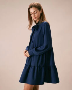 The Blue Tie-Neck Tiered Babydoll Mini Dress 10 The Blue Tie-Neck Tiered Babydoll Mini Dress -CINN Clothing Shop the tie neck collar babydoll dress dresses 8raaaa