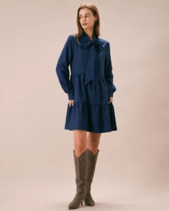 The Blue Tie-Neck Tiered Babydoll Mini Dress 9 The Blue Tie-Neck Tiered Babydoll Mini Dress -CINN Clothing Shop the tie neck collar babydoll dress dresses 9zlhjl