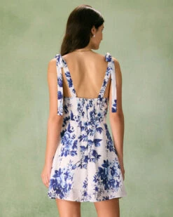 The Blue Floral Tie Strap Mini Dress -CINN Clothing Shop the tie strap floral mini dress dresses epcfmv