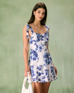 The Blue Floral Tie Strap Mini Dress -CINN Clothing Shop the tie strap floral mini dress dresses p2fnea