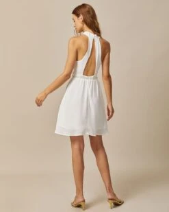 The White Mock Neck Pearls Backless Mini Dress 11 The White Mock Neck Pearls Backless Mini Dress -CINN Clothing Shop the white halter pearl mini dress dresses 7r4kps 919955