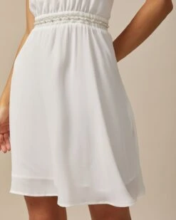 The White Mock Neck Pearls Backless Mini Dress 10 The White Mock Neck Pearls Backless Mini Dress -CINN Clothing Shop the white halter pearl mini dress dresses ys2t6s 312311